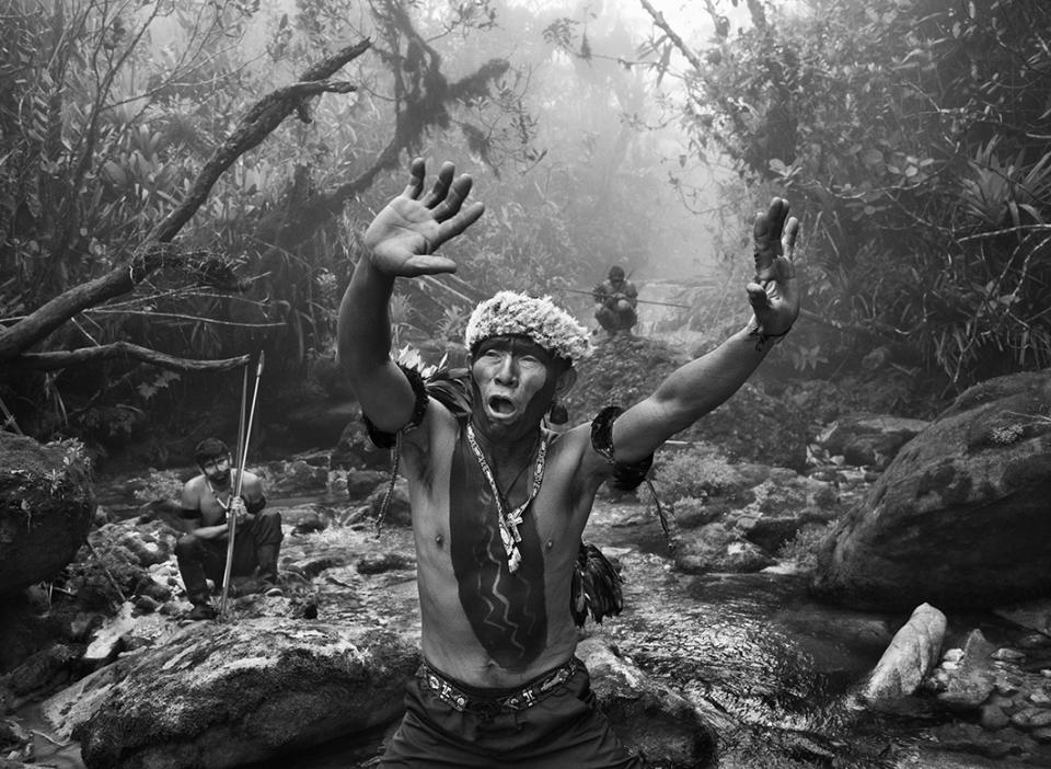 Sebastião Salgado "Yanomami shaman in dialogue with spirits, before climbing Mount Pico da Neblina", State of Amazonas, Brasil, 2014