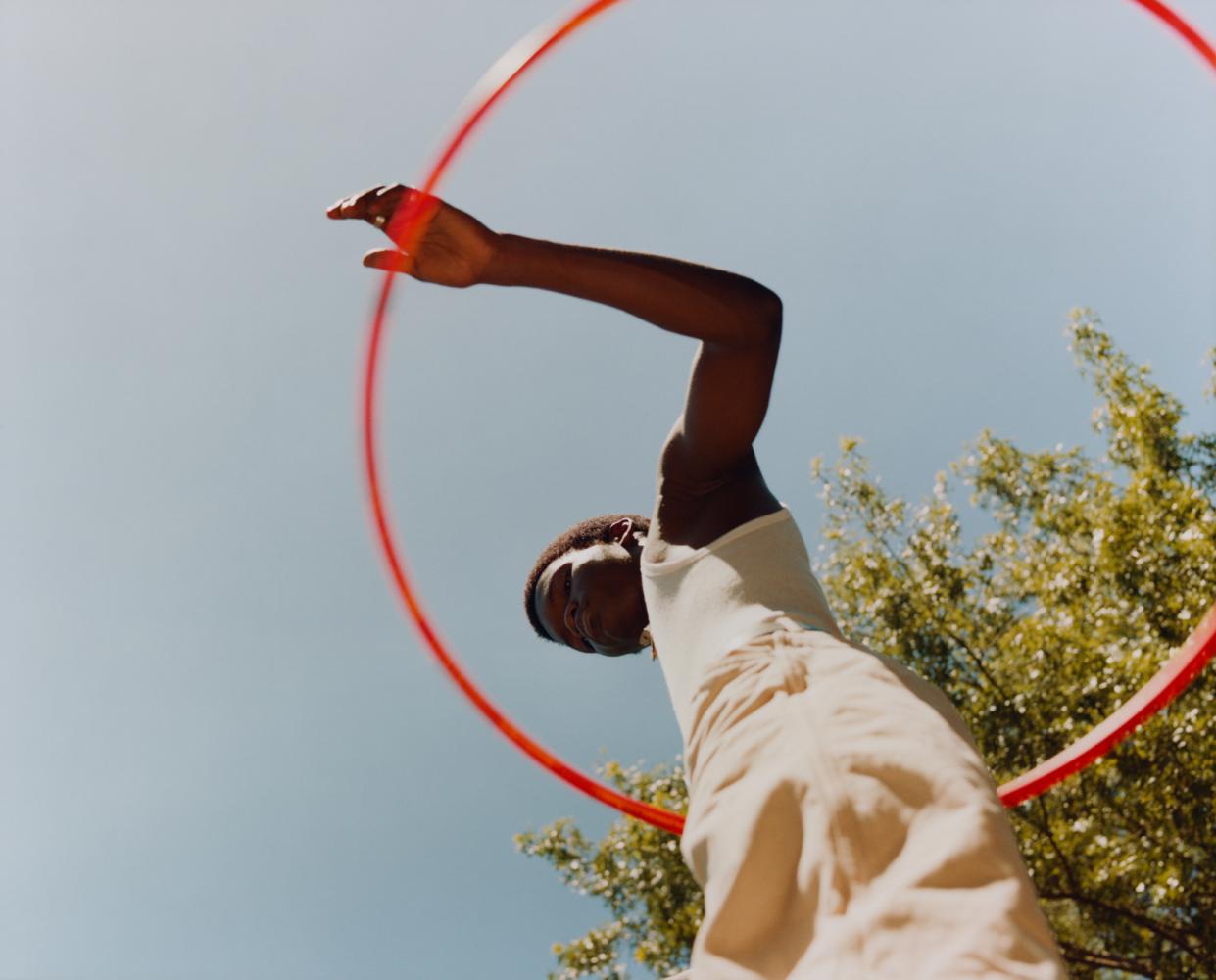 Tyler Mitchell "Untitled (Sosa with Orange Hula Hoop)", 2019