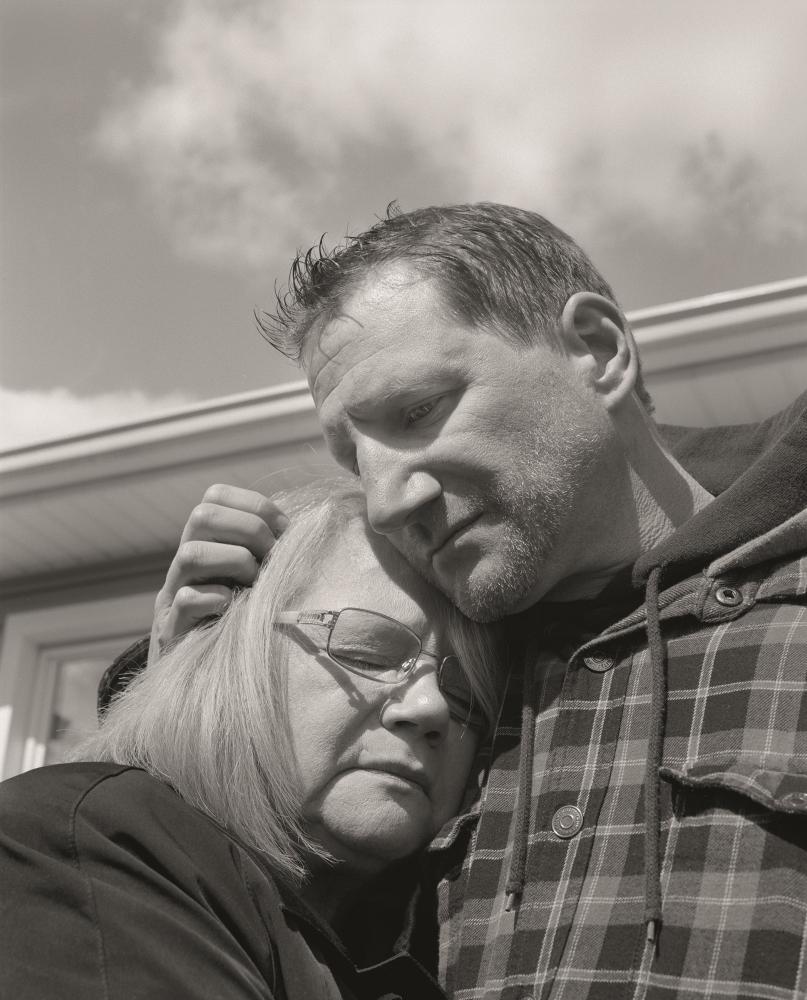 Jonathan Auckey holding his mother Kathleen