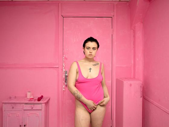 Agata Kay in a Pink bathing suite in a pink room in Paris, November 2nd, 2017. Photo taken by Bieke Depoorter