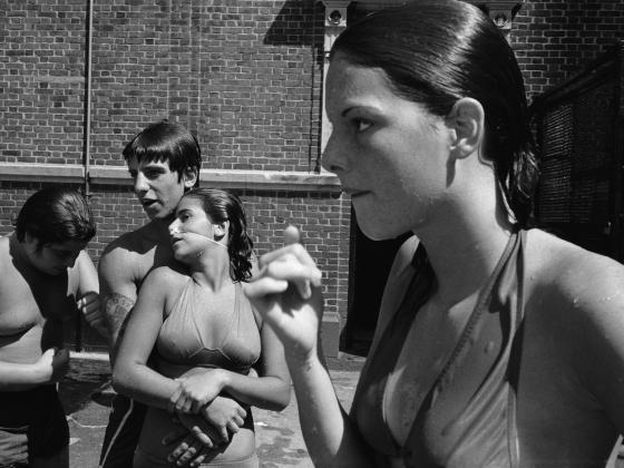 Black-and-White Photograph by Susan Meiselas of Pebbles with Enzo and Tina at the Carmine Street pool, Little Italy, New York, 1978